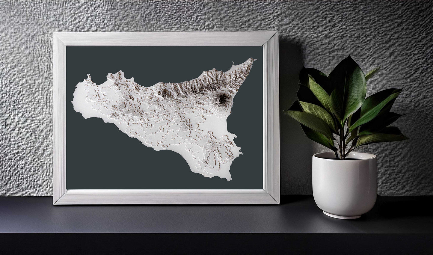 In this image the 3D raised relief map of Sicily is showcased on a shelf in a white frame. Thanks to its minimalist design it will look great in most home style decorations.