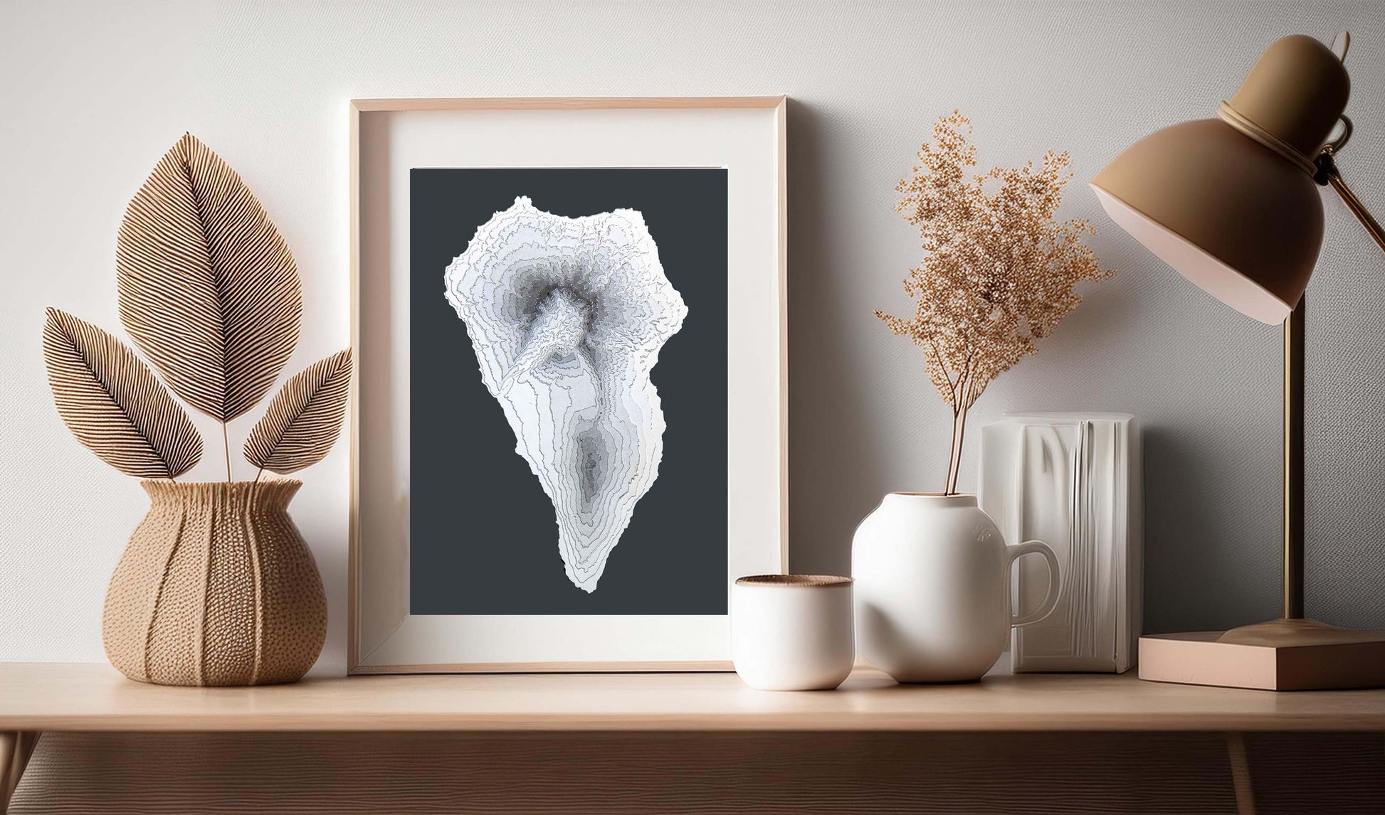 The raised relief map of La Palma is created with minimalism in mind. Thanks to its greyscale colour palette, the map will look good on any wall or perched on top of a shelf. A4 sized and portrait oriented.